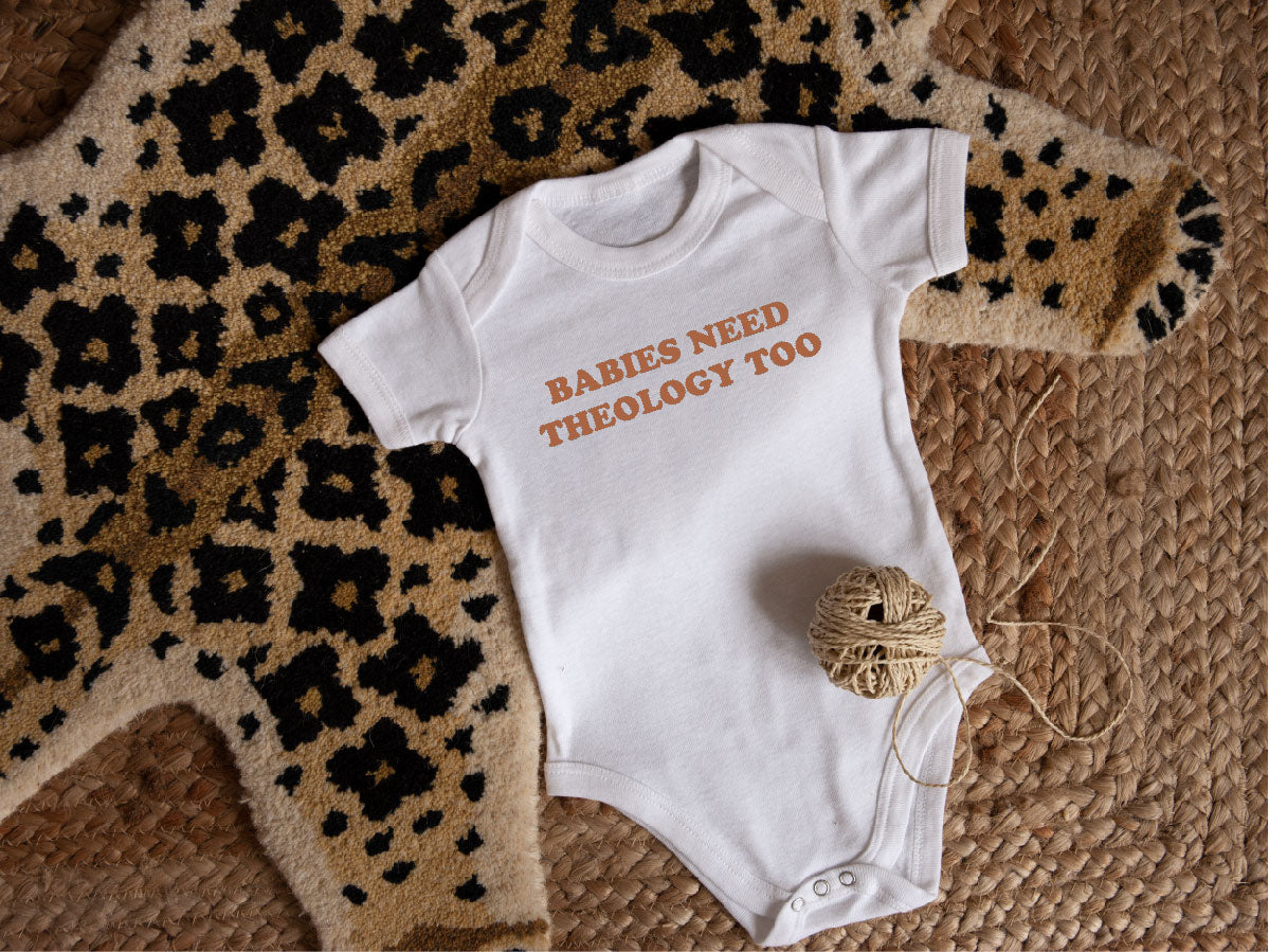 Babies Need Theology Too (orange) Onesie
