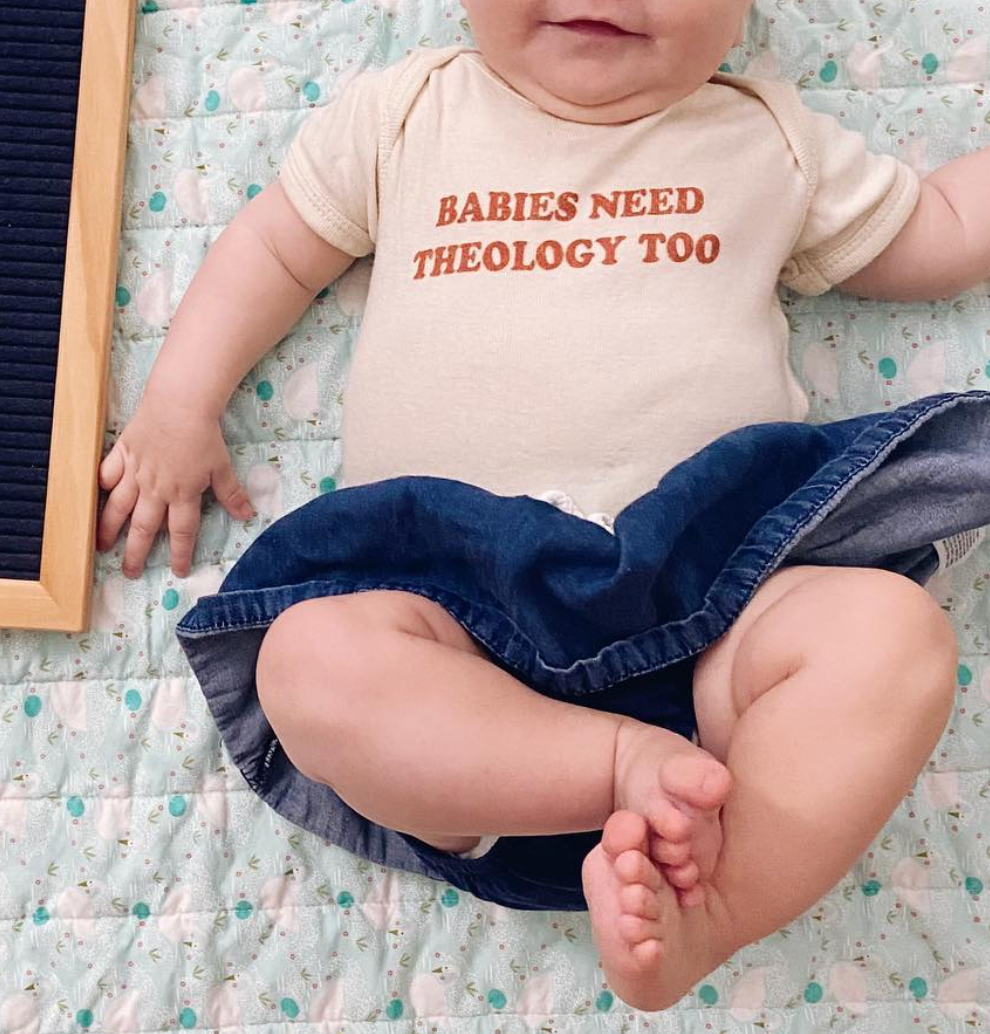 Babies Need Theology Too (orange) Onesie